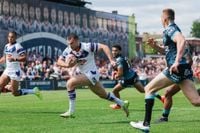 A dramatic Joe Ofahengaue try denied Wakefield Trinity what would have been a great comeback against Leigh Leopards