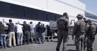 South Korea says it is helping citizens return voluntarily after huge Hyundai raid