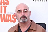 Oasis guitarist Bonehead to miss tour leg after cancer diagnosis