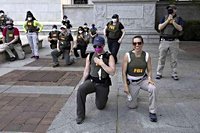 FBI fires agents photographed kneeling during 2020 racial justice protest | Jefferson City News-Tribune