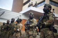 Federal agents told Portland police to 'help or get out of the way' after firing pepper balls at local officer