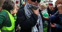 Member of Irish rap group Kneecap appears at UK court on terrorism charge