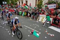 Spanish minister says Israeli team should be expelled from Vuelta after protest