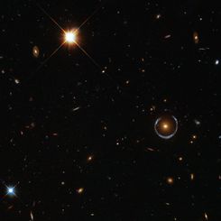 A Horseshoe Einstein Ring from Hubble