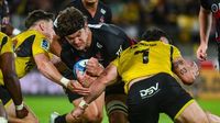 Crusaders survive late trouble to top Hurricanes