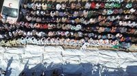 Mass funeral in Gaza as signs of torture reported on Palestinian bodies returned by Israel