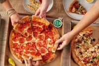 US pizza giant grabs slice of Northern Ireland market with 20 new stores and 400 jobs...'This new agreement is an exciting milestone'