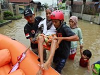 Flood deaths rise to 174 in Indonesia, surge across Southeast Asia