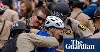 At least 11 detained after protesters and police clash outside Chicago Ice center
