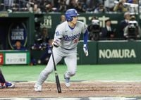 Shohei Ohtani and Dodgers get title defense off to winning start against Cubs