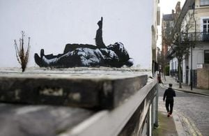 Banksy Unveils Twin Murals In London As Christmas Nears