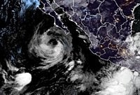 Hurricane Priscilla moves along Mexico in the Pacific as Tropical Storm Jerry churns in the Atlantic