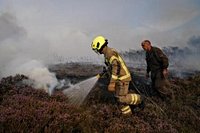 At least 18 WWII-era weapons explode as wildfire chars U.K. countryside