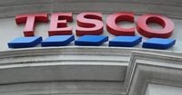 Tesco lifts profit outlook after lowered prices boosts trading