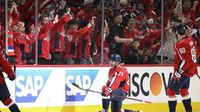 Caps look more like themselves beating Hurricanes 3-1 to tie series