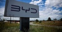 Why are Chinese automakers like BYD launching fast-charging EV systems?