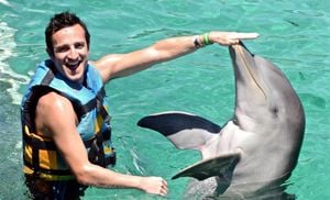 Man Encounters Over 100 Dolphins During Hydroflyer Ride