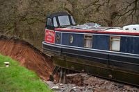 Boat left perched on the edge of Whitchurch canal breach rescued in late-night operation