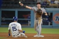 Austin Barnes signs with longtime Dodgers rival