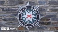 West Belfast: Police cars rammed during pursuit