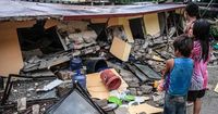 Rescuers desperately search for survivors of earthquake in the Philippines that killed at least 72