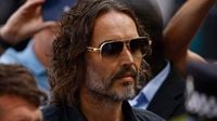 Russell Brand arrives at court in London to face sex assault charges