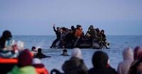 Two more people deported under UK-France migrant returns deal