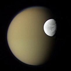 Saturn's Moons Dione and Titan from Cassini
