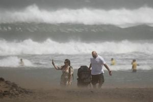 UK Basks In Sunshine While Spain Faces Storms