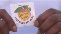 Georgia strikes 478,000 people from voter rolls