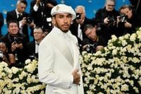 Lewis Hamilton shines at the 2025 Met Gala in a suit full of African symbols