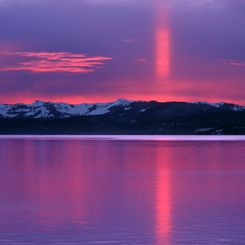 A Sun Pillar in Red and Violet