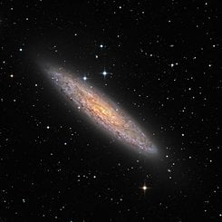  NGC 253: Dusty Island Universe 