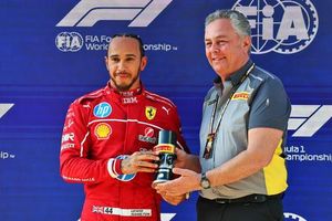 Lewis Hamilton Secures First Pole Position With Ferrari