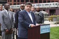 Trump’s threat to deploy troops to Chicago sparks fear and defiance in a city on edge