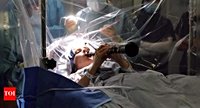 UK woman with Parkinson's plays clarinet during deep brain stimulation surgery; here’s what happens next | - The Times of India