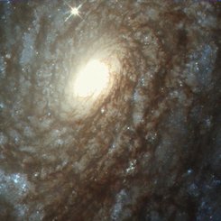 NGC 4414: A Flocculent Spiral Galaxy