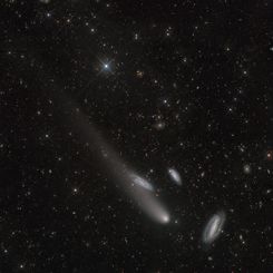  Three Galaxies and a Comet 