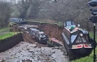 Major incident as giant SINKHOLE swallows canal sparking rescue mission