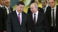Xi meets Putin in Moscow, vows to tackle international 'bullying' with Russia